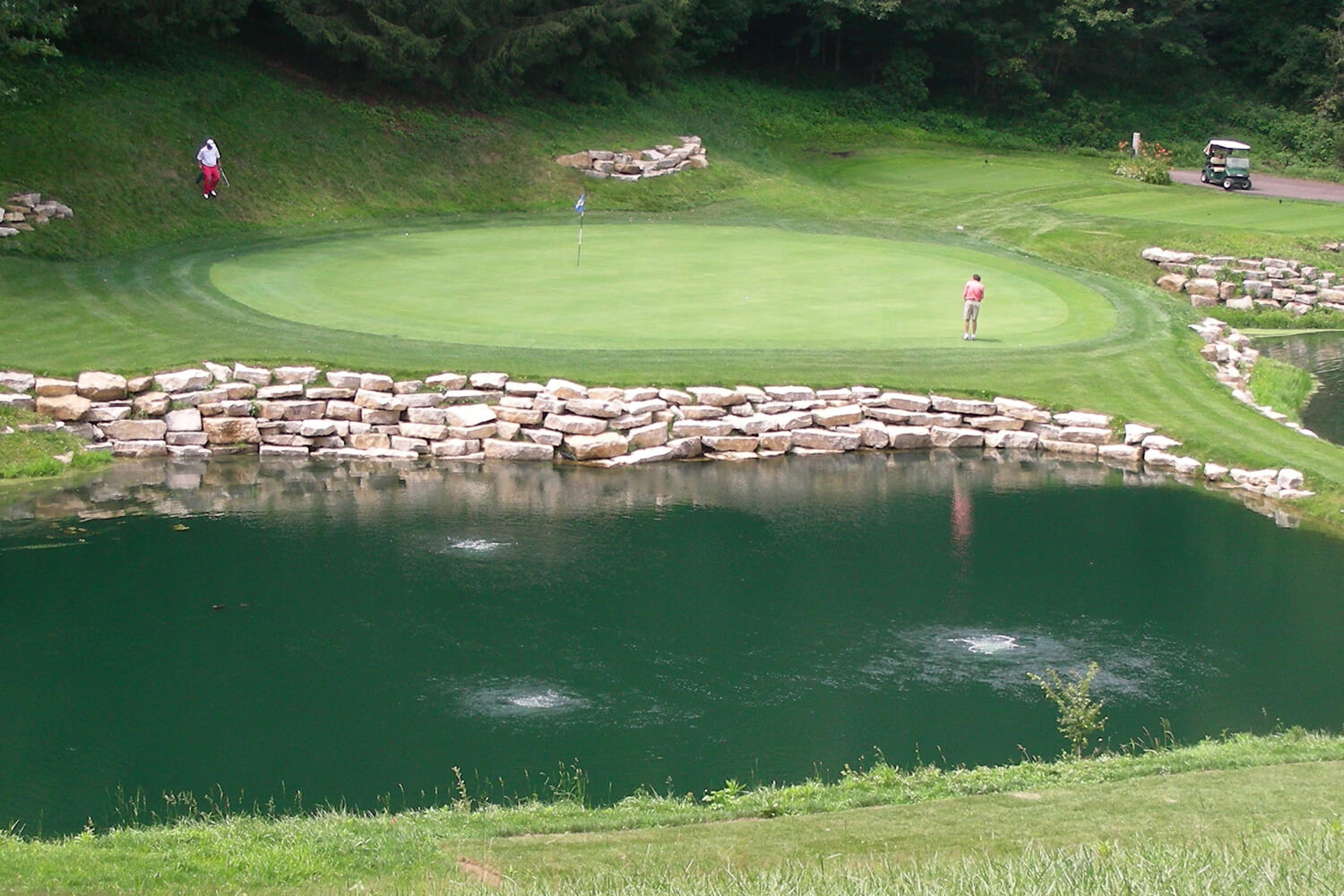 An Otterbine Aerating Fountain Otterbine with Air Flo Diffused Aeration at a golf course