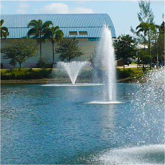 Three fountains in a lake